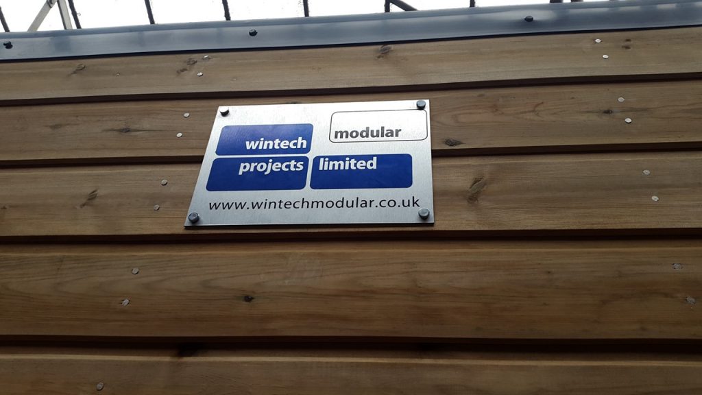 Wintech Modular Buildings logo on side of portable washroom