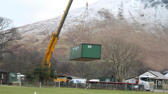 Moving a modular building portable washroom