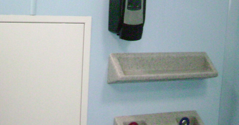 sink and mirror in a modular toilet facility