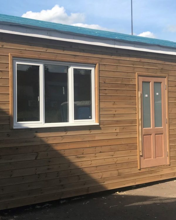 Timber cladding on a single modular cabin